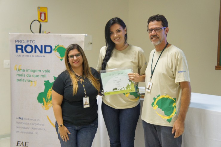 Mariana Prado Mueller (Núcleo de Extensão), Melissa Kintopp Belem (Publicidade e Propaganda), Marco Antonio R. Pedroso (coordenador do curso de Design e coordenador do Projeto Rondon na FAE).